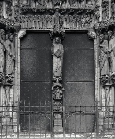 Beau Christ figure on the trumeau of the south portal by French School
